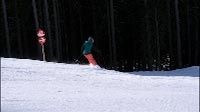 Single Skier On Red Piste